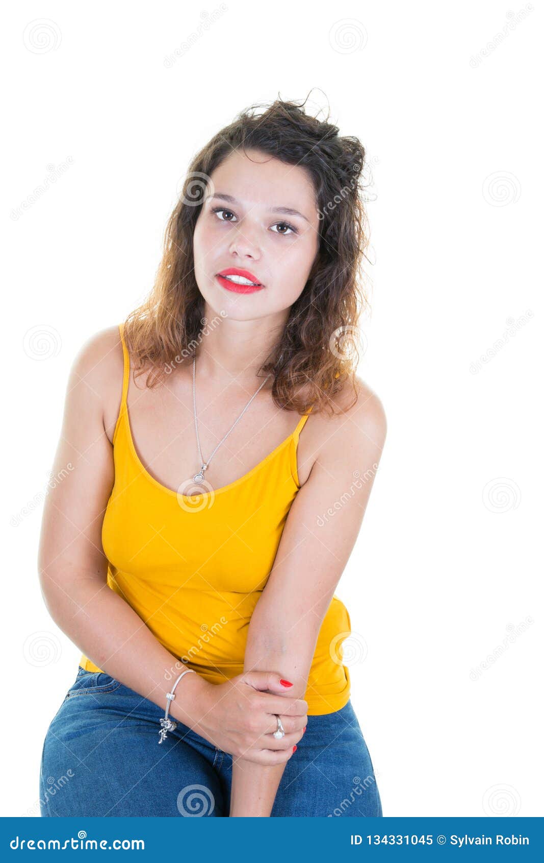 Cute Pretty Curly Brunette Girl Sit On White Background In