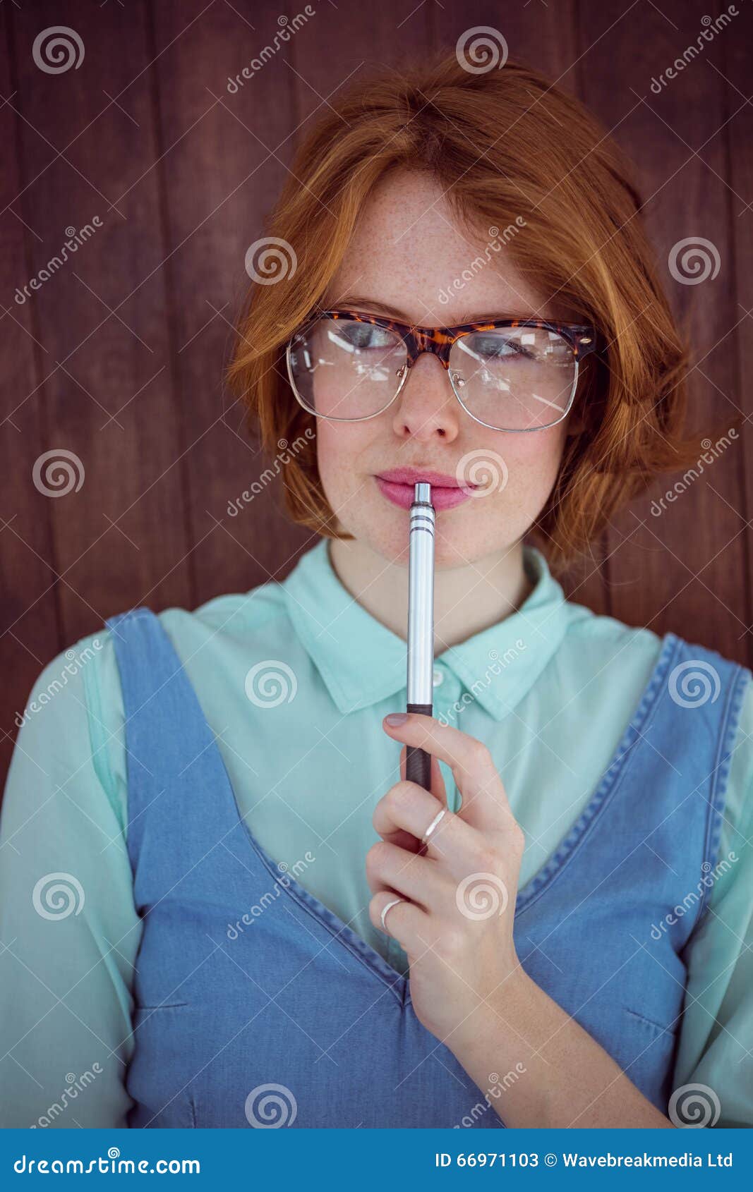 Cute Red Haired Hipster Chewing A Pen Stock Image - Image of beautiful ...