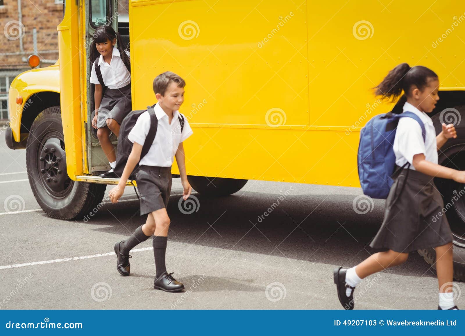 Cute Schoolchildren Getting Off the School Bus Stock Image Image of