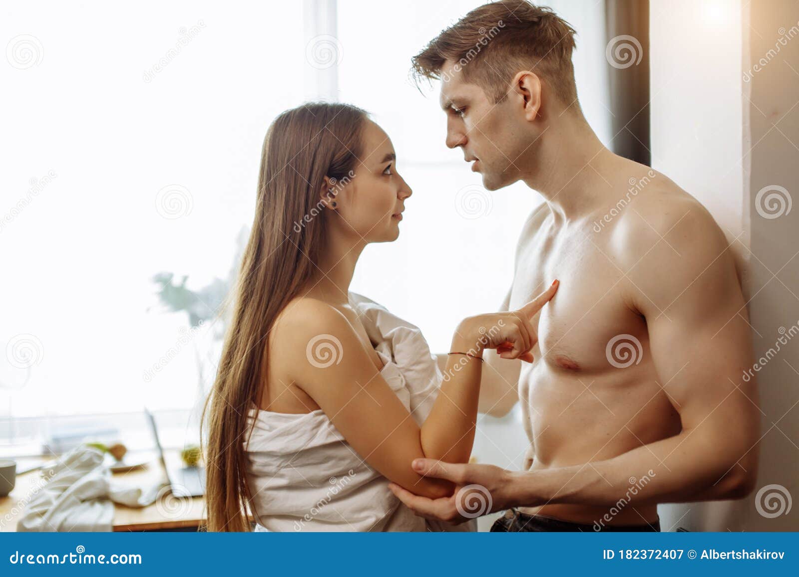 Woman Hints at Sex with Her Boyfriend at Home Stock Image photo