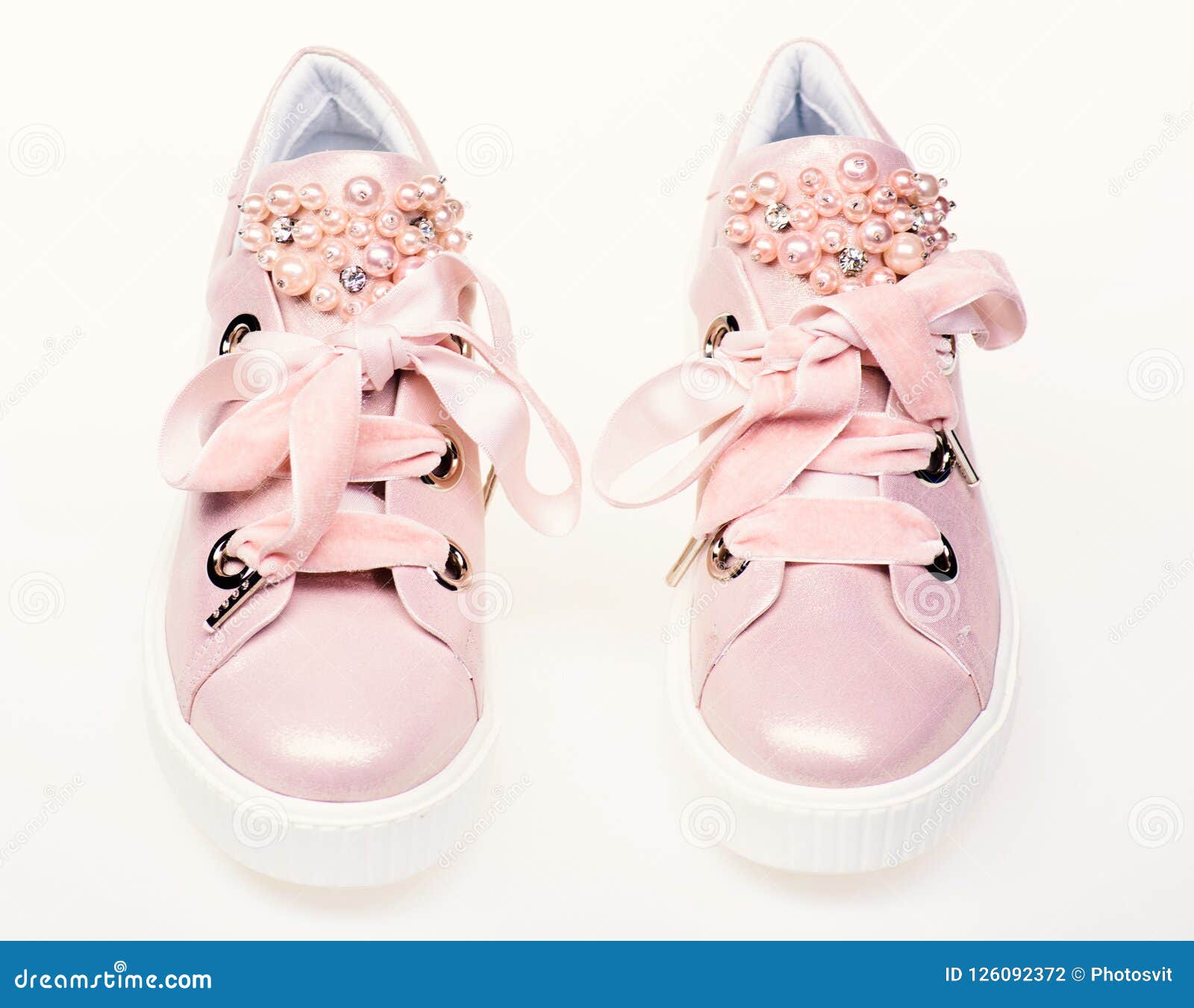 Glamorous Sneakers Concept. Pair of Pale Pink Female Sneakers with ...