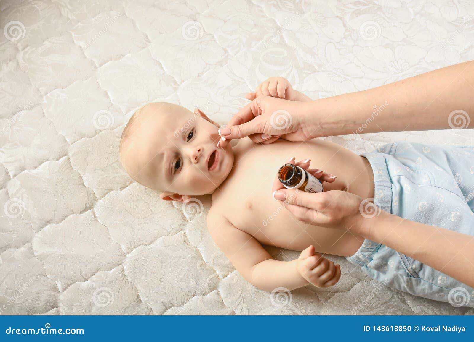 Cute Sick Child, Baby Boy, Staying in Bed, Mom Giving Him Medicine 