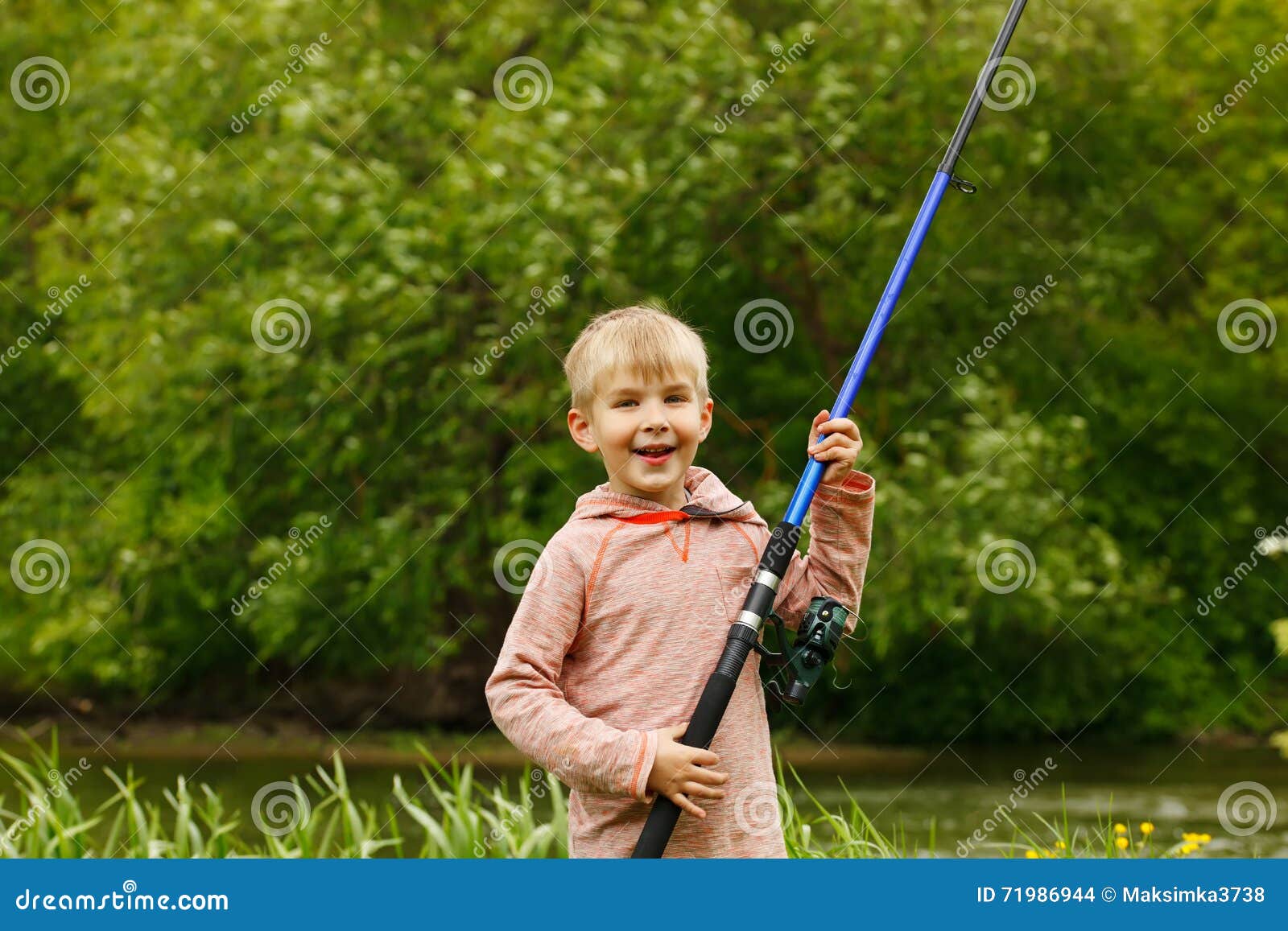 Cute Small Boy Stand Near a River with a Fishing Rod in His Hands. Stock  Photo - Image of carefree, fishing: 71986944