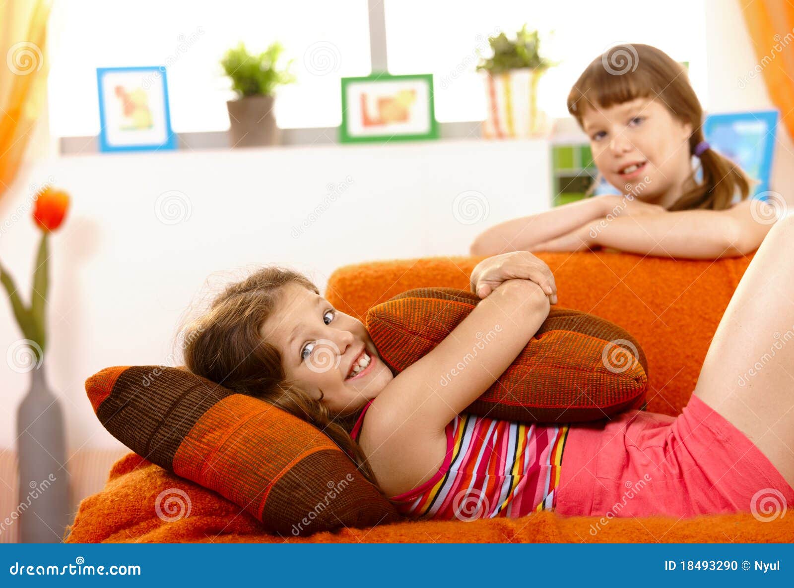 Cute small girl on sofa stock photo. Image of caucasian 18493290