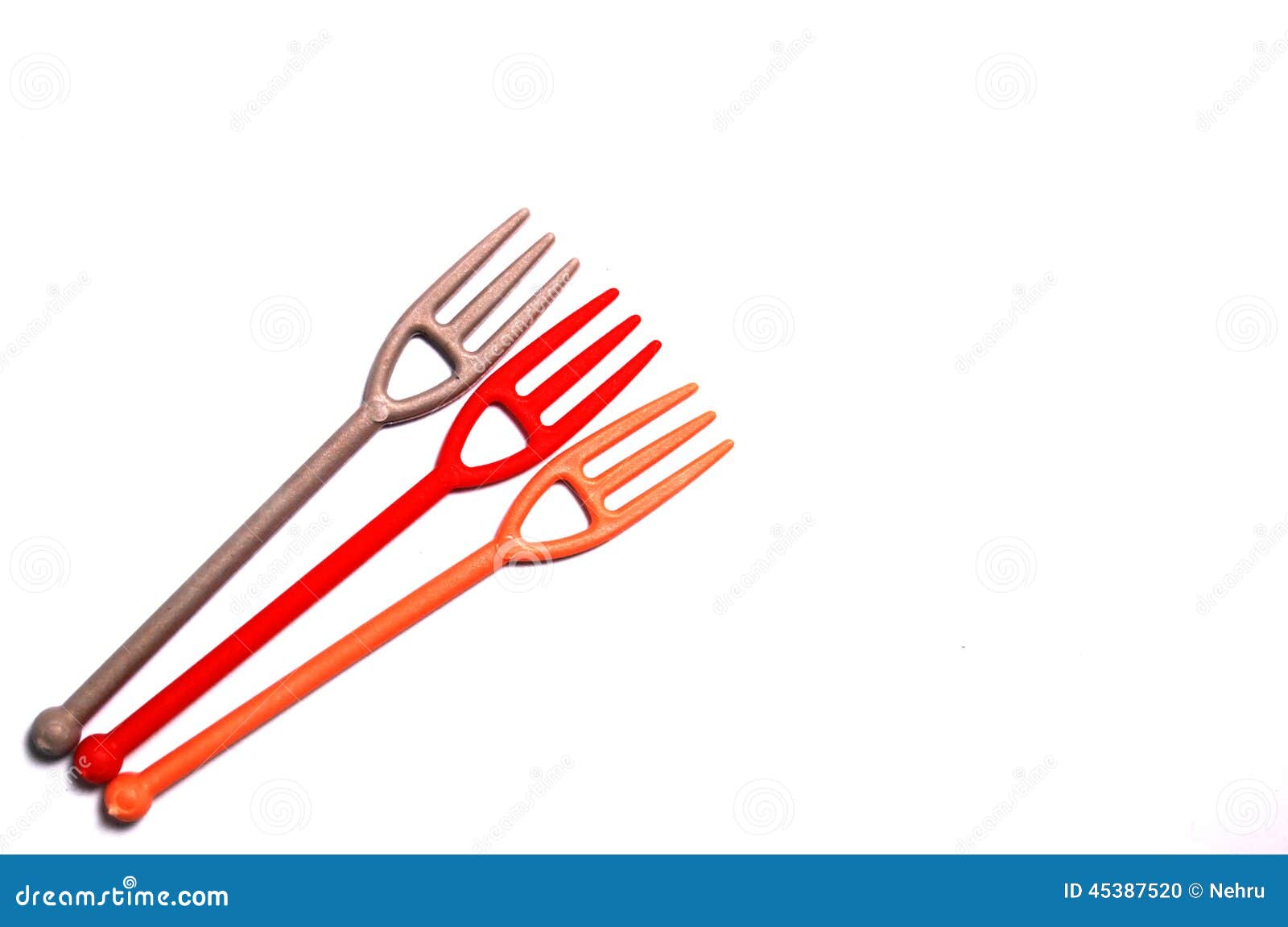 Cute small plastic forks stock photo. Image of green 45387520