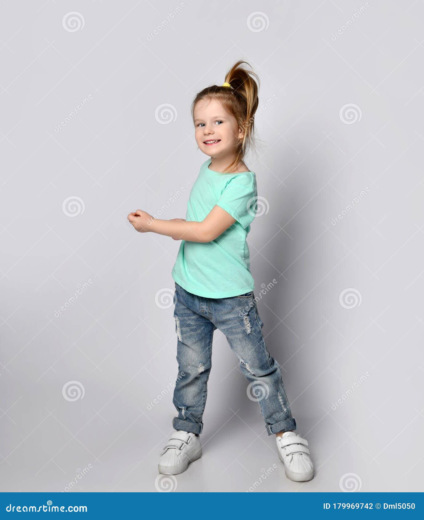 Cute Smiling Blond Baby Girl with Ponytail Hairstyle in Stylish Casual Clothing and Sneakers is Posing Dancing Stock Photo - Image of collection, background: 179969742 Cute Smiling Blond Baby Girl with Ponytail Hairstyle in Stylish Casual Clothing and Sneakers is Posing Dancing Stock Photo - Image of collection, background: 179969742