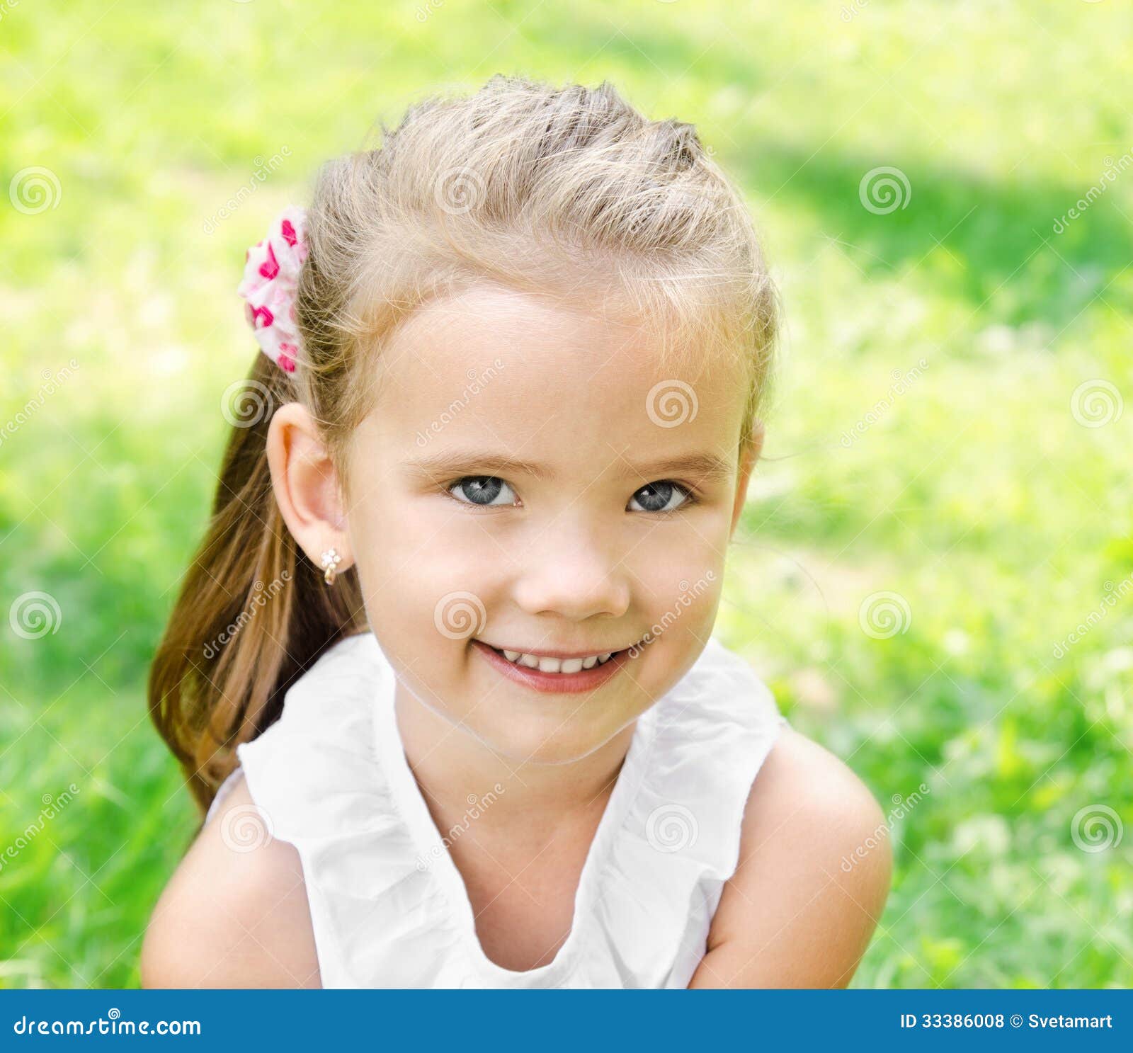 Cute Smiling Little Girl on the Meadow Stock Photo - Image of green ...