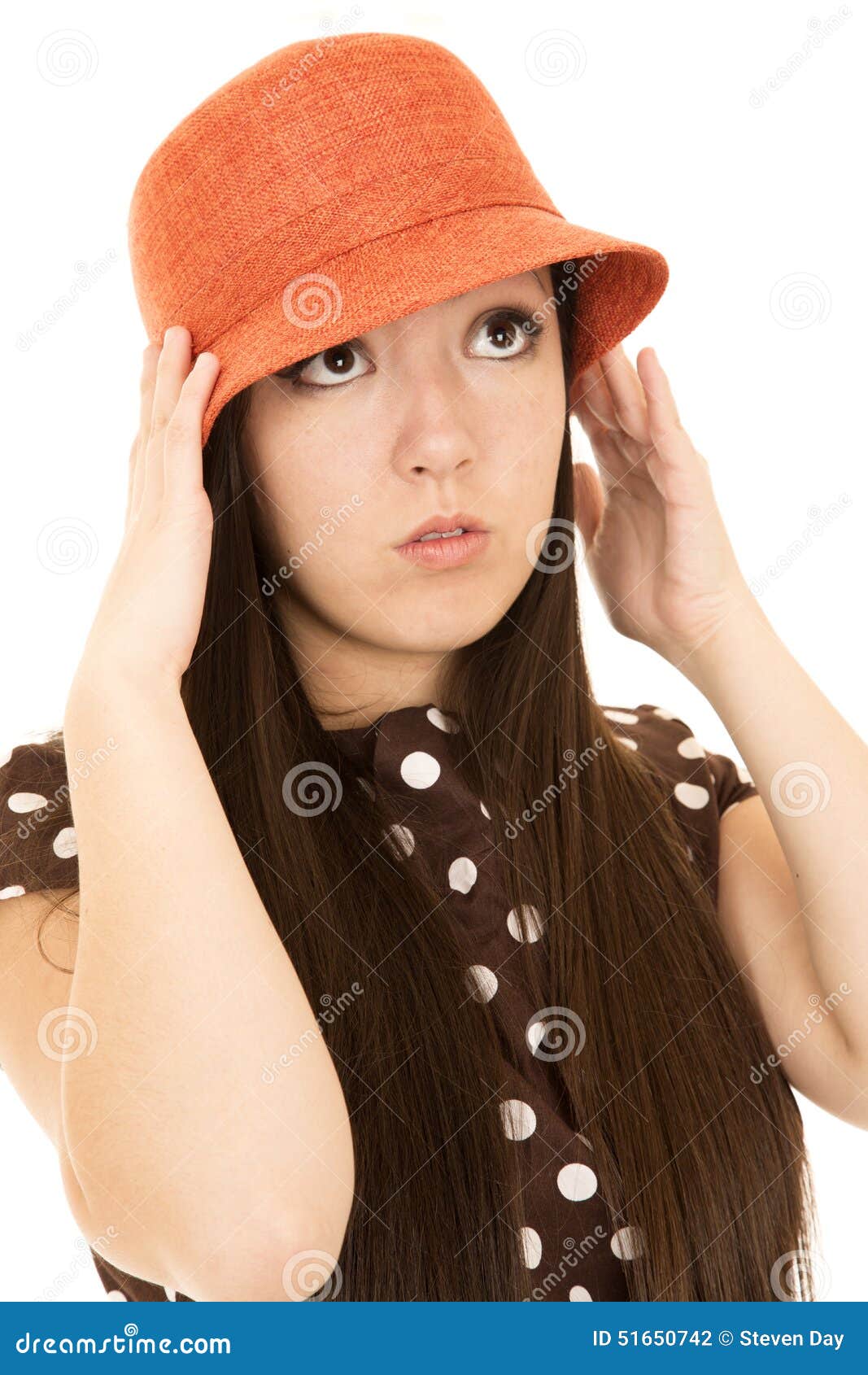 Cute Teen Girl Model Adjusting Her Orange Hat