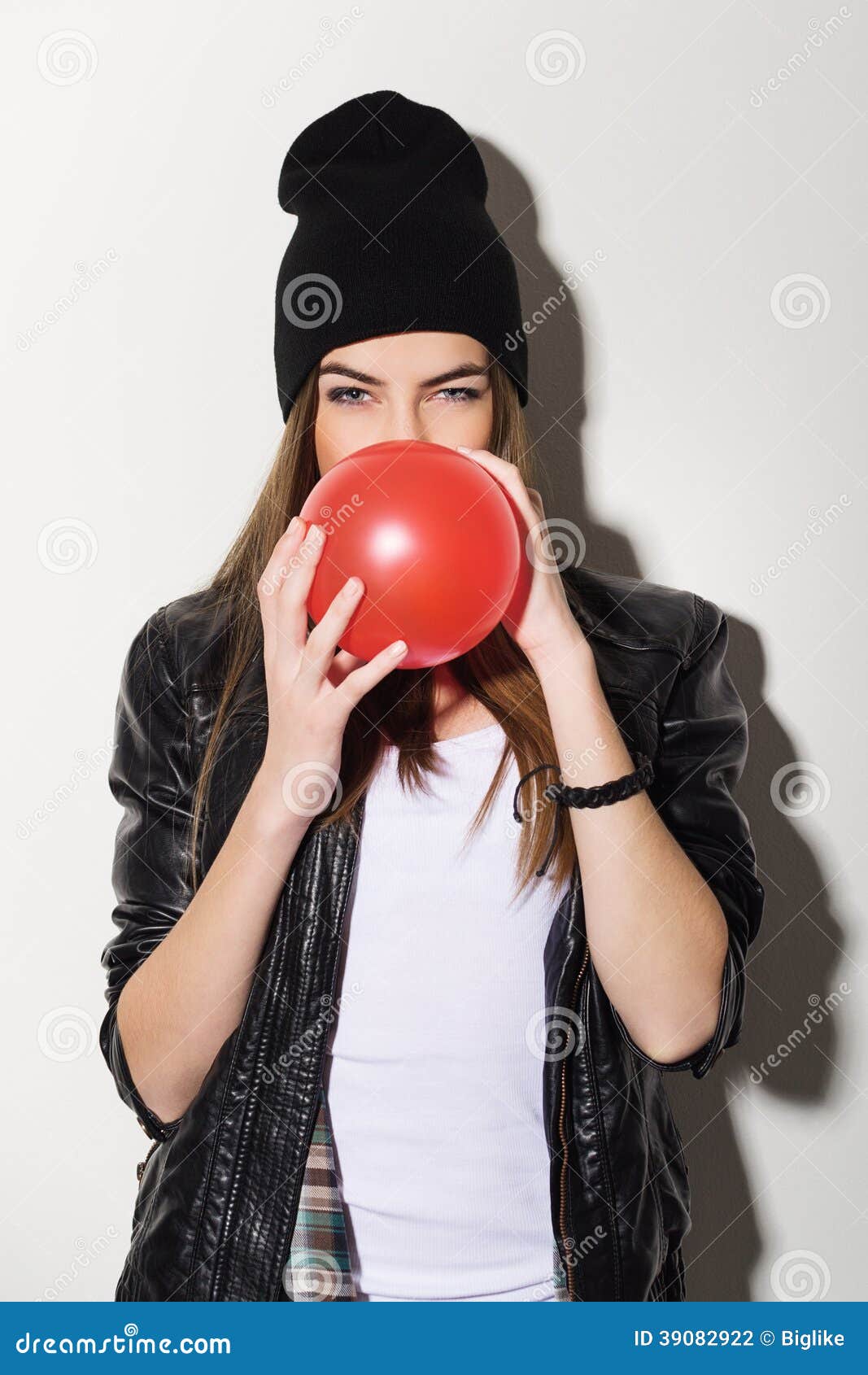 Attractive Young Woman In Glasses And Knitted Cap. Red Lipstick