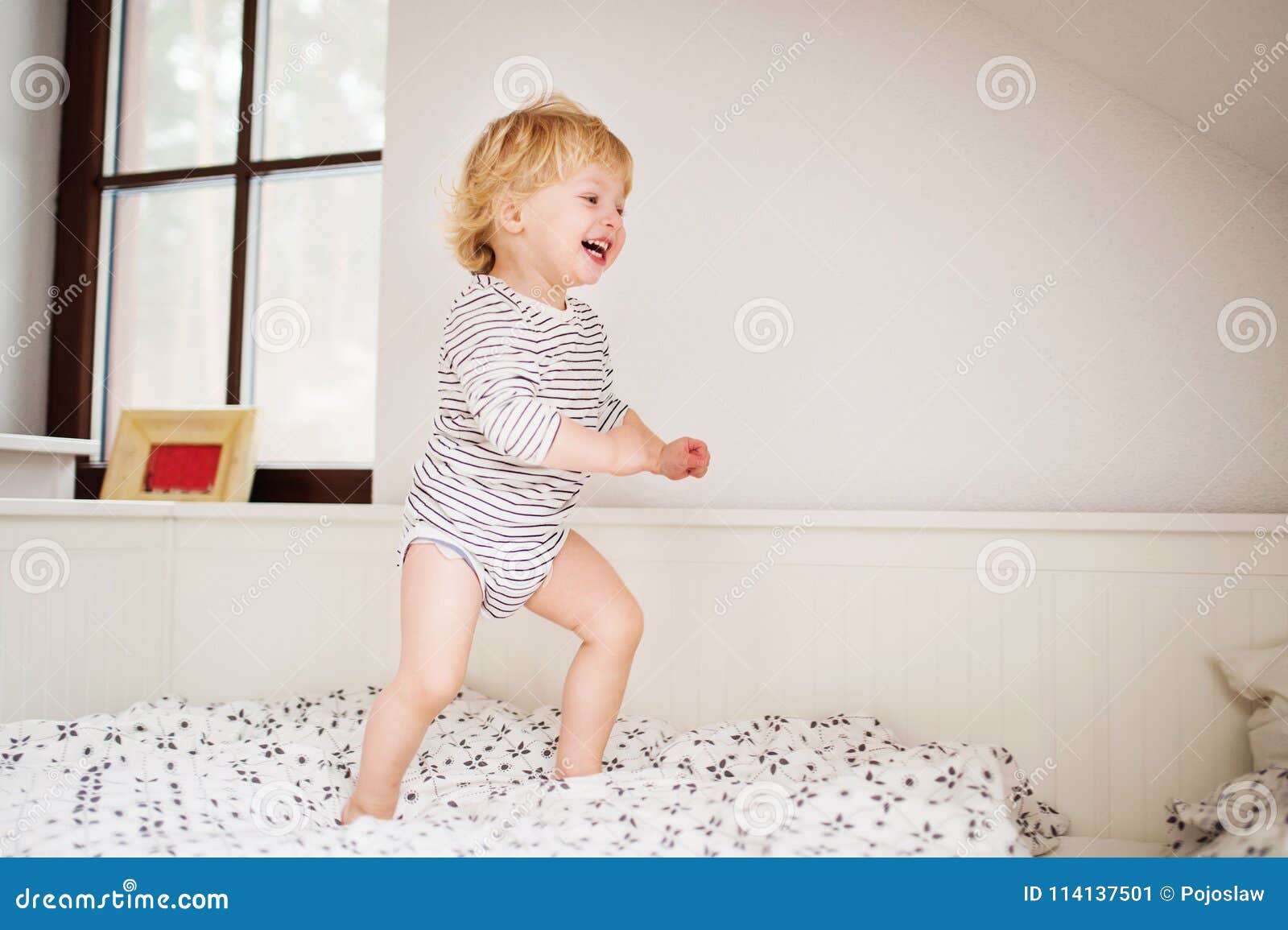 Cute Toddler Boy Jumping On The Bed Stock Photo - Download Image Now - Baby  - Human Age, Jumping, Child - iStock