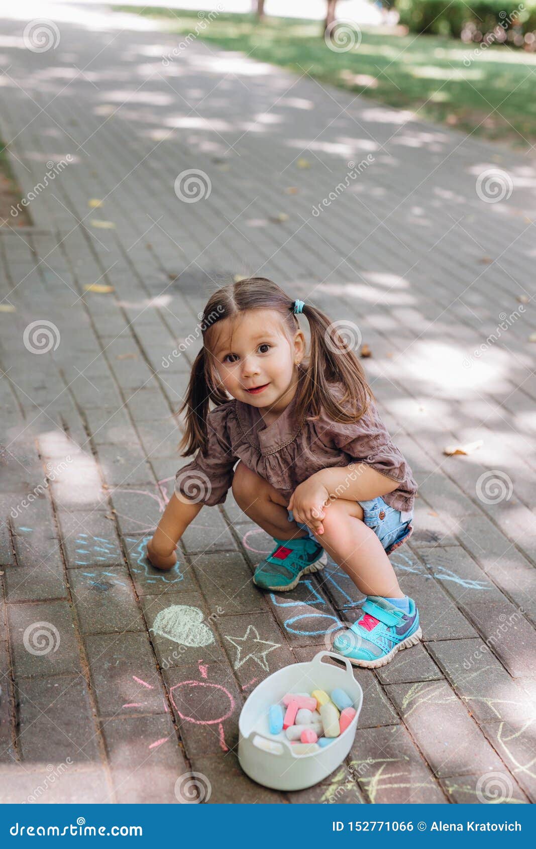 Cute Little Girl Drawing With Chalk Outdoors Stock Photo 