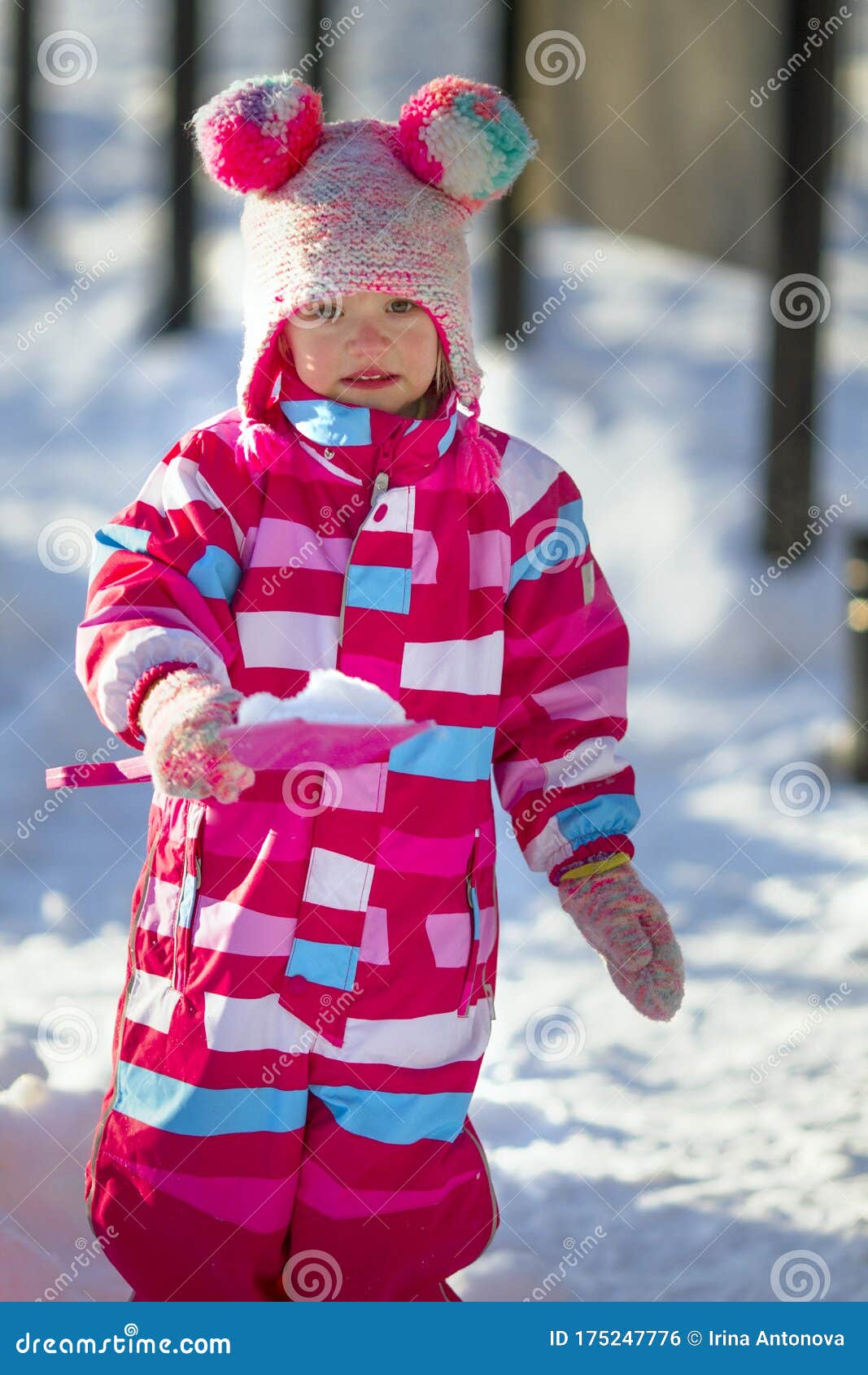 Cute Toddler Girl Wearing Bright Colored Overall and Funny Hat in ...