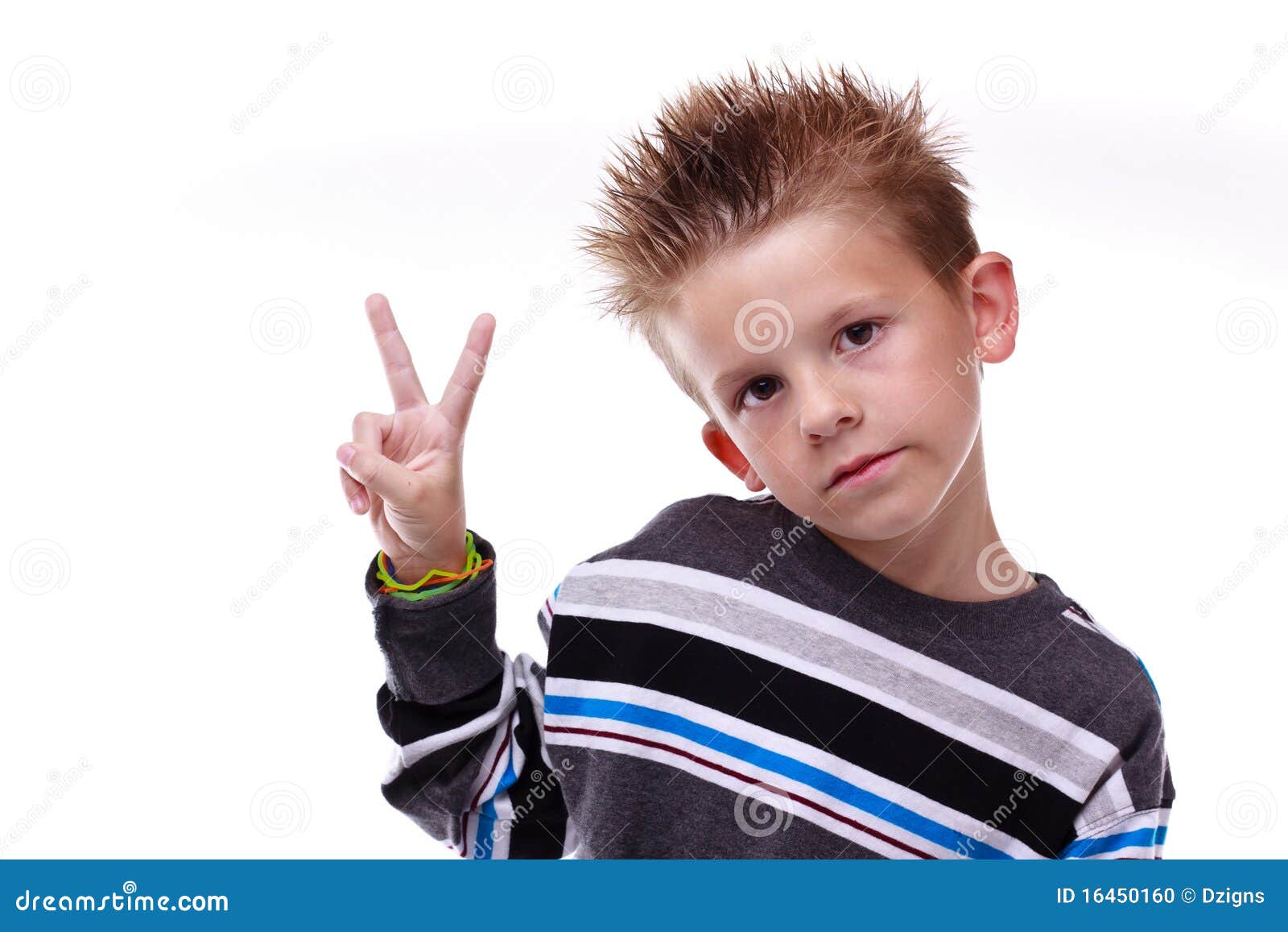 Cute Young Boy Holding Up The Peace Sign Stock Photo - Image: 16450160