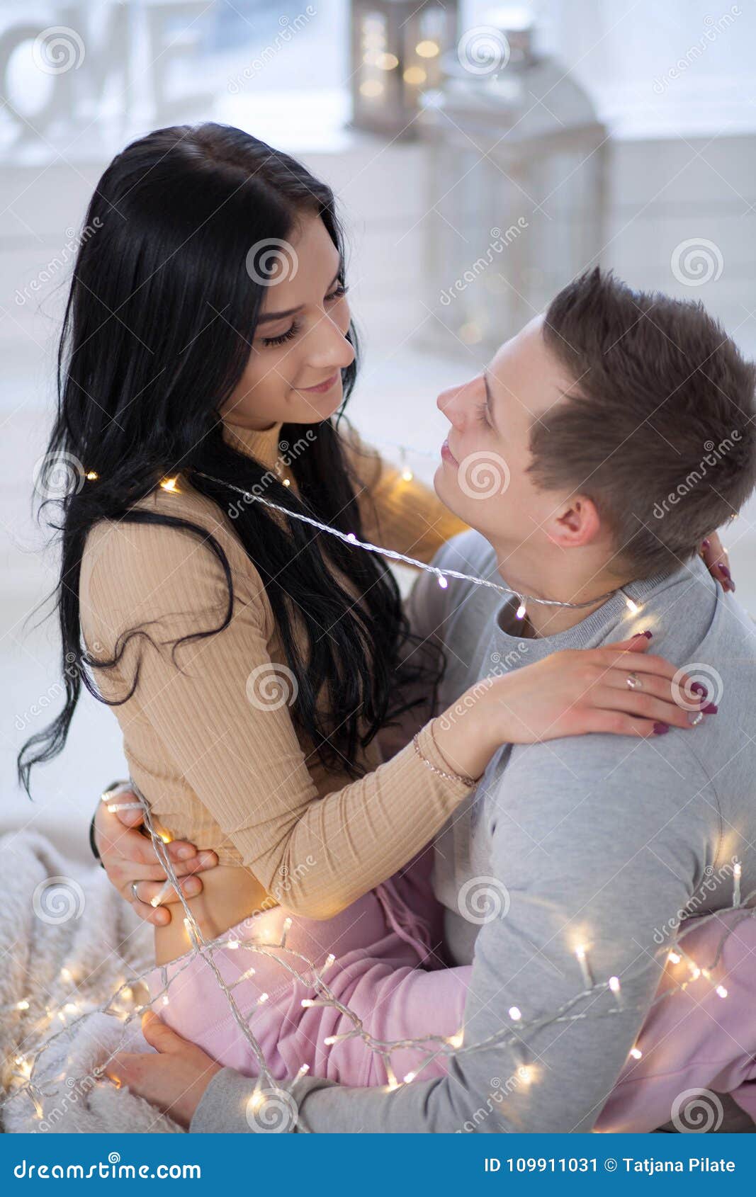 Couple in Love Hugging and Kissing at Home Stock Image - Image of