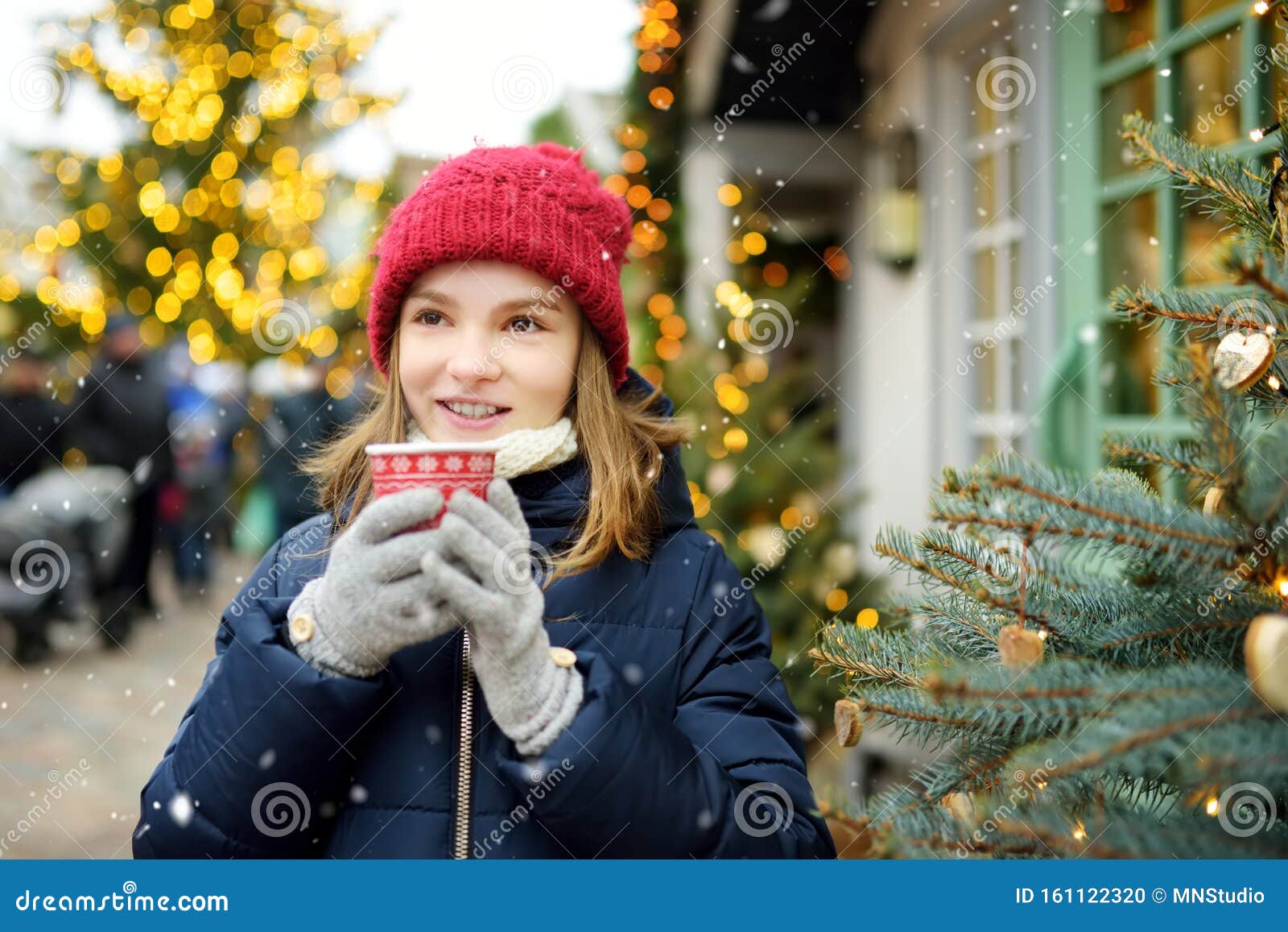 Cute Young Girl Drinking Hot Chocolate on Traditional Christmas Fair in ...