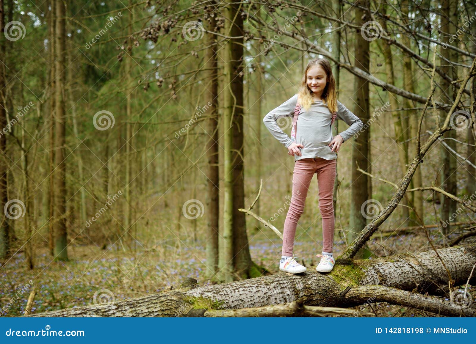 Cute Young Girl Having Fun During Forest Hike On Beau