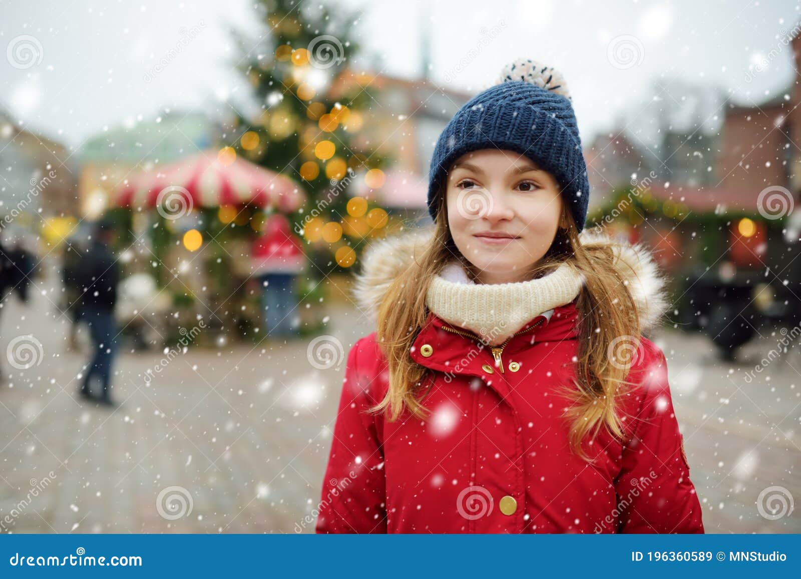 Cute Young Girl Having Fun on Traditional Christmas Fair in Riga ...