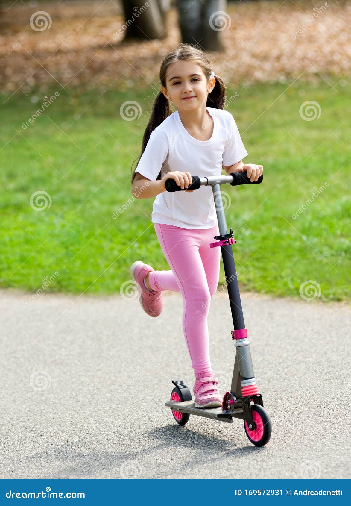 little girl on scooter