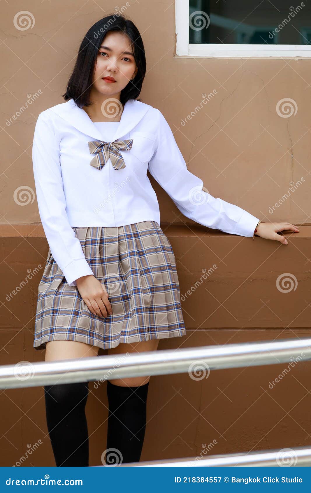 Cute and Young Girl Wearing Japanese, Korean Style Schoolgirl