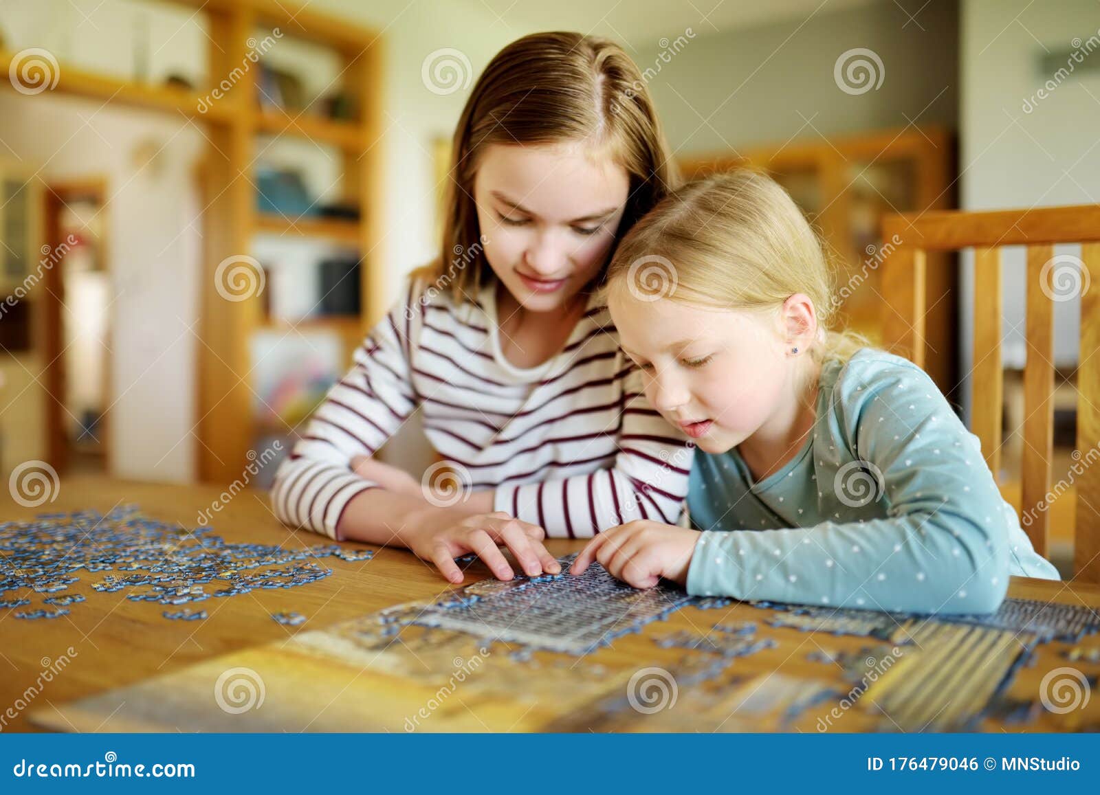 Little girl preschooler learning online solving puzzles playing educational  games on laptop at home - a Royalty Free Stock Photo from Photocase