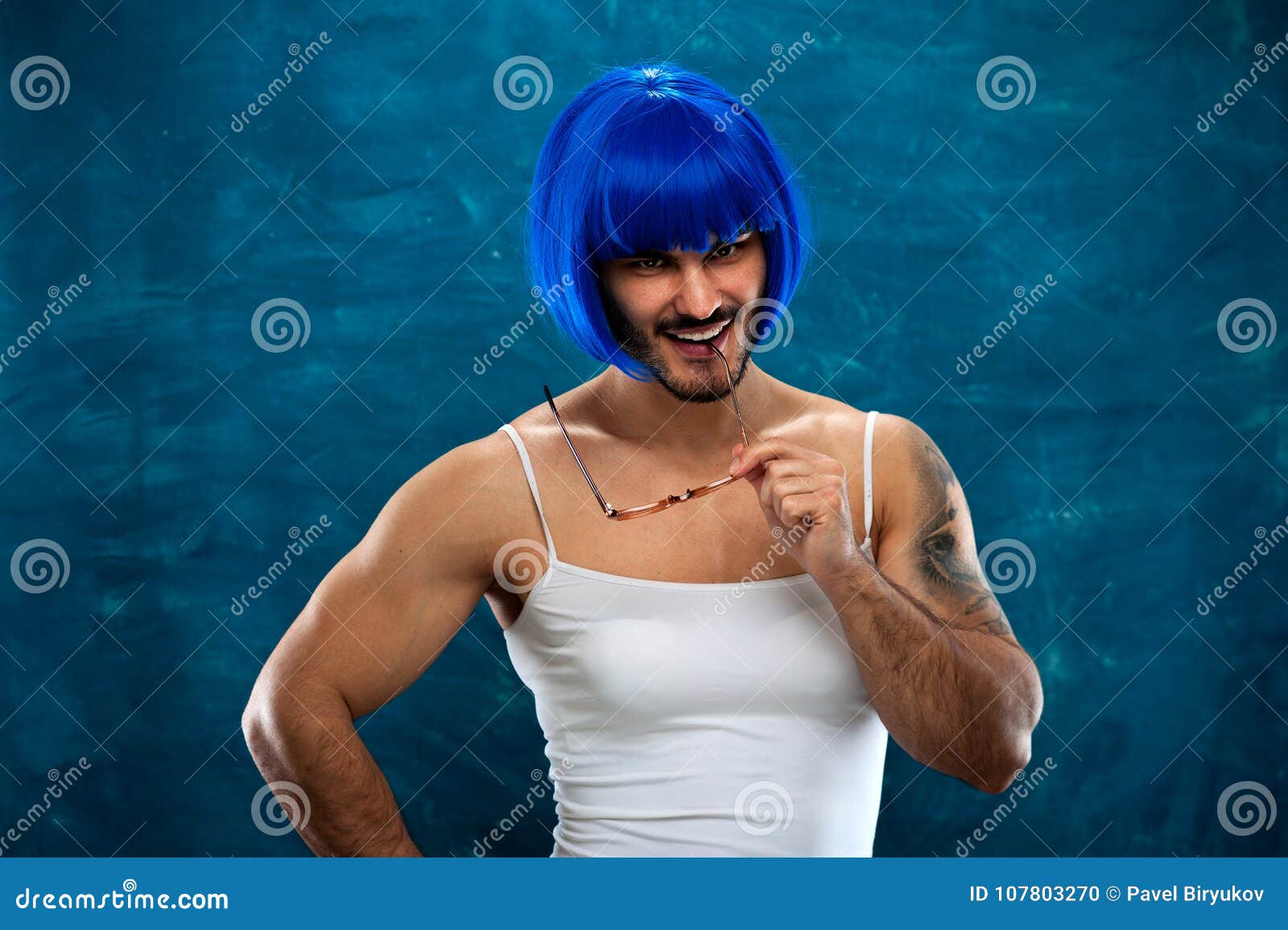 Cute Young Man Wearing Blue Wig And Female Cloth Stock Photo