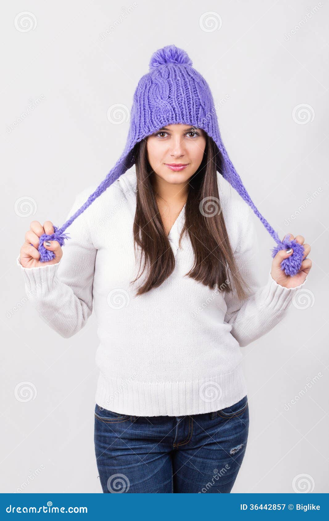 Cute Young Teenage Girl Wearing Purple Beanie Hat