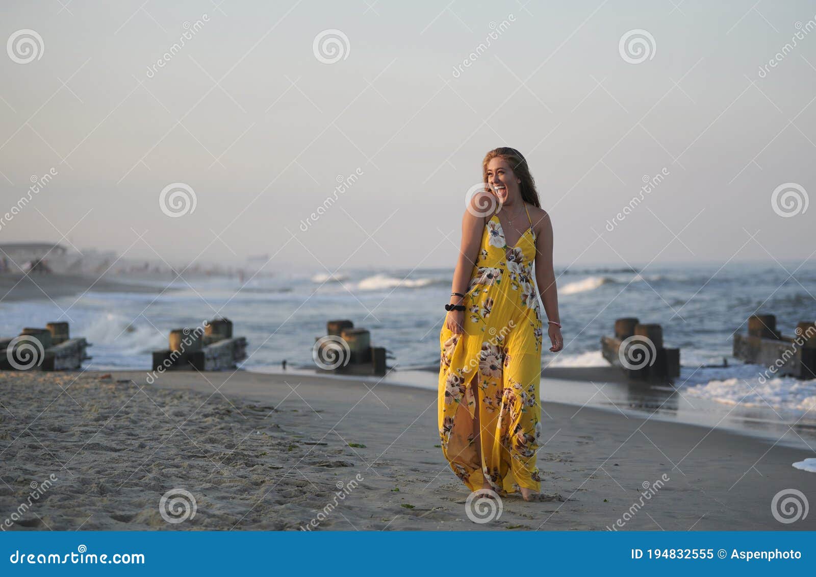 Cute Young Woman in Stunning Yellow Dress at Beach Stock Image - Image ...