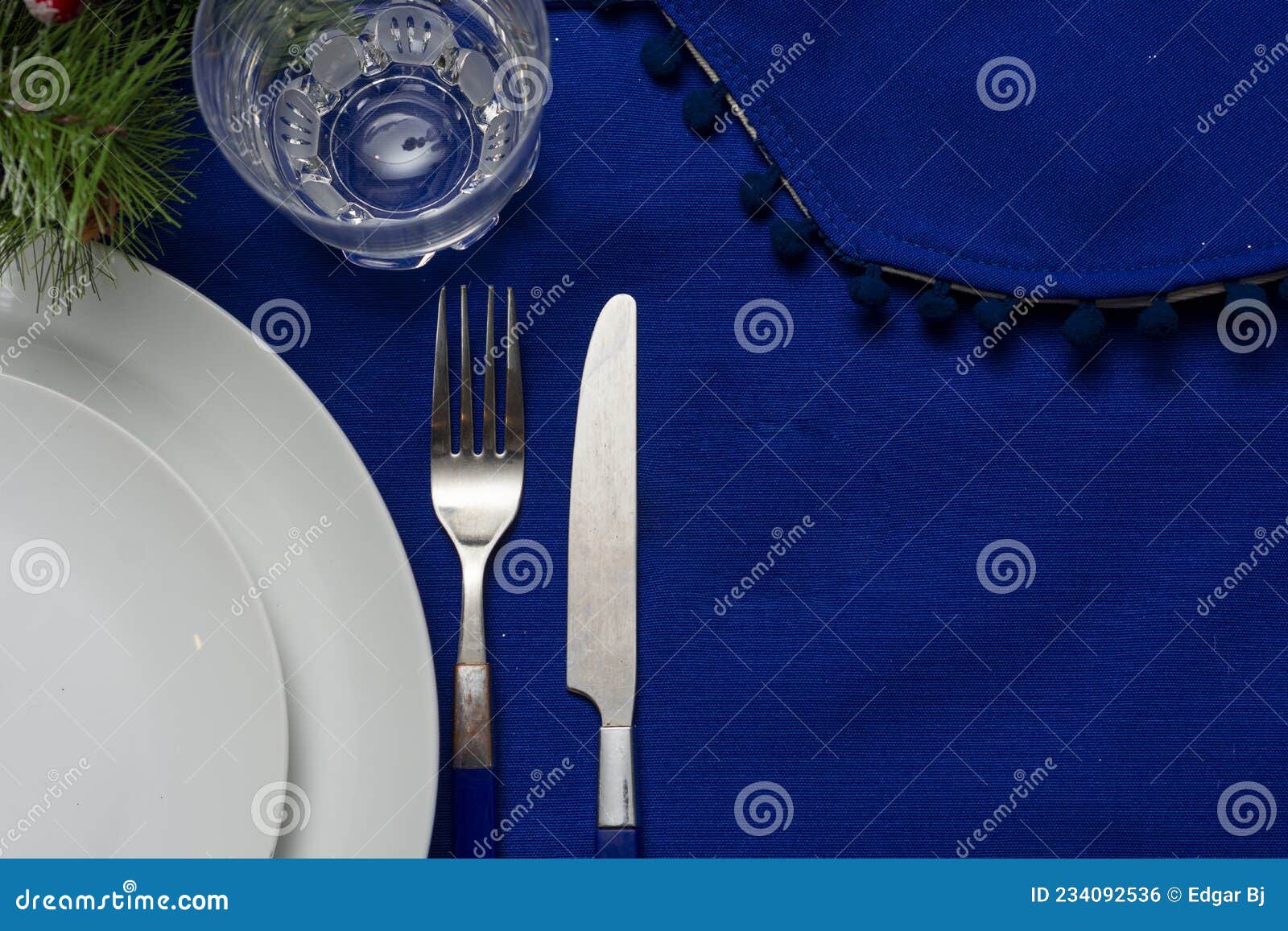 Cutlery, Crockery and Glassware on Blue Tablecloths Stock Photo Image