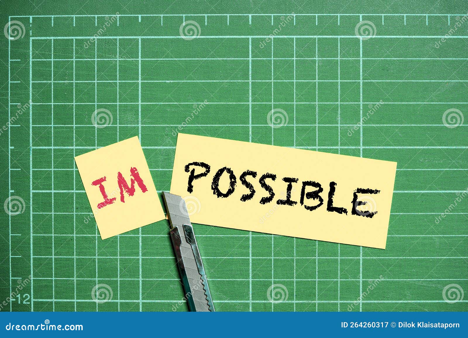 cutlery knife cut paper to change wording from impossible to possible for positive thinking mindset to success and challenge