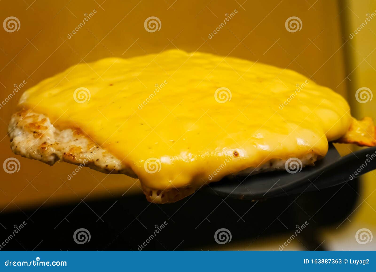 Cutlet with Melted Cheese on Plastic Spatula Stock Image Image of