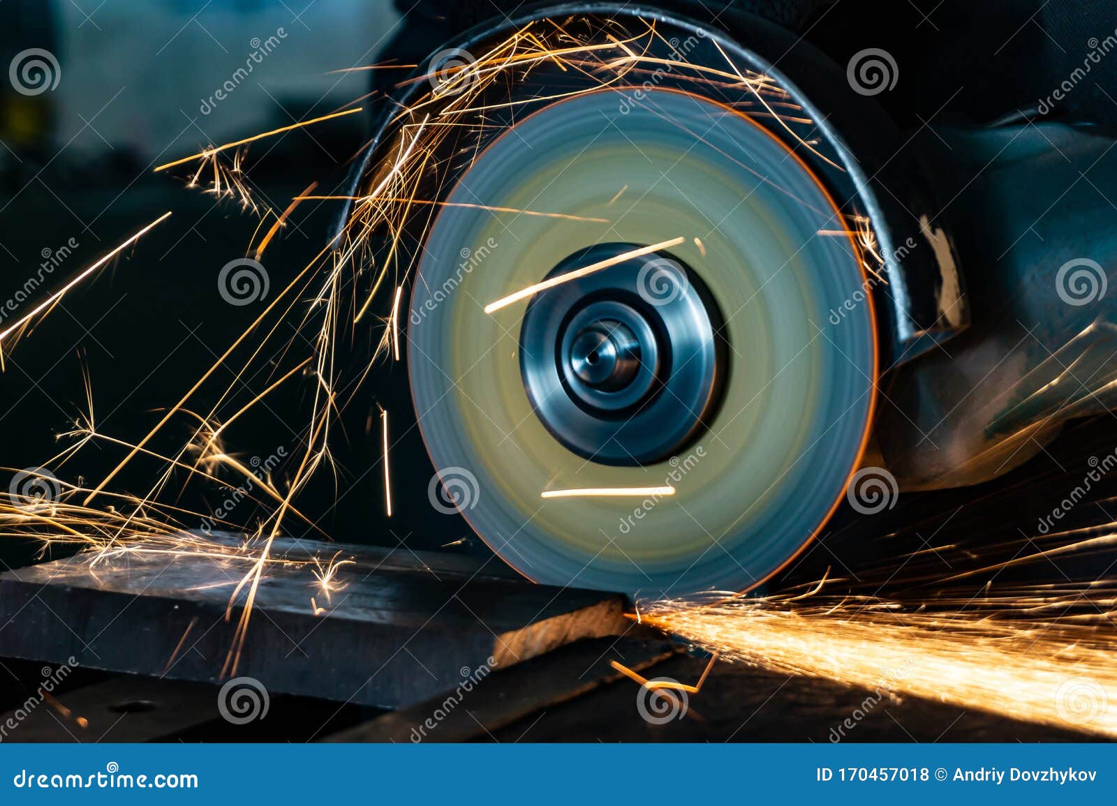 Cutting Abrasive Wheel on a Grinder in Work, Closeup Stock Photo