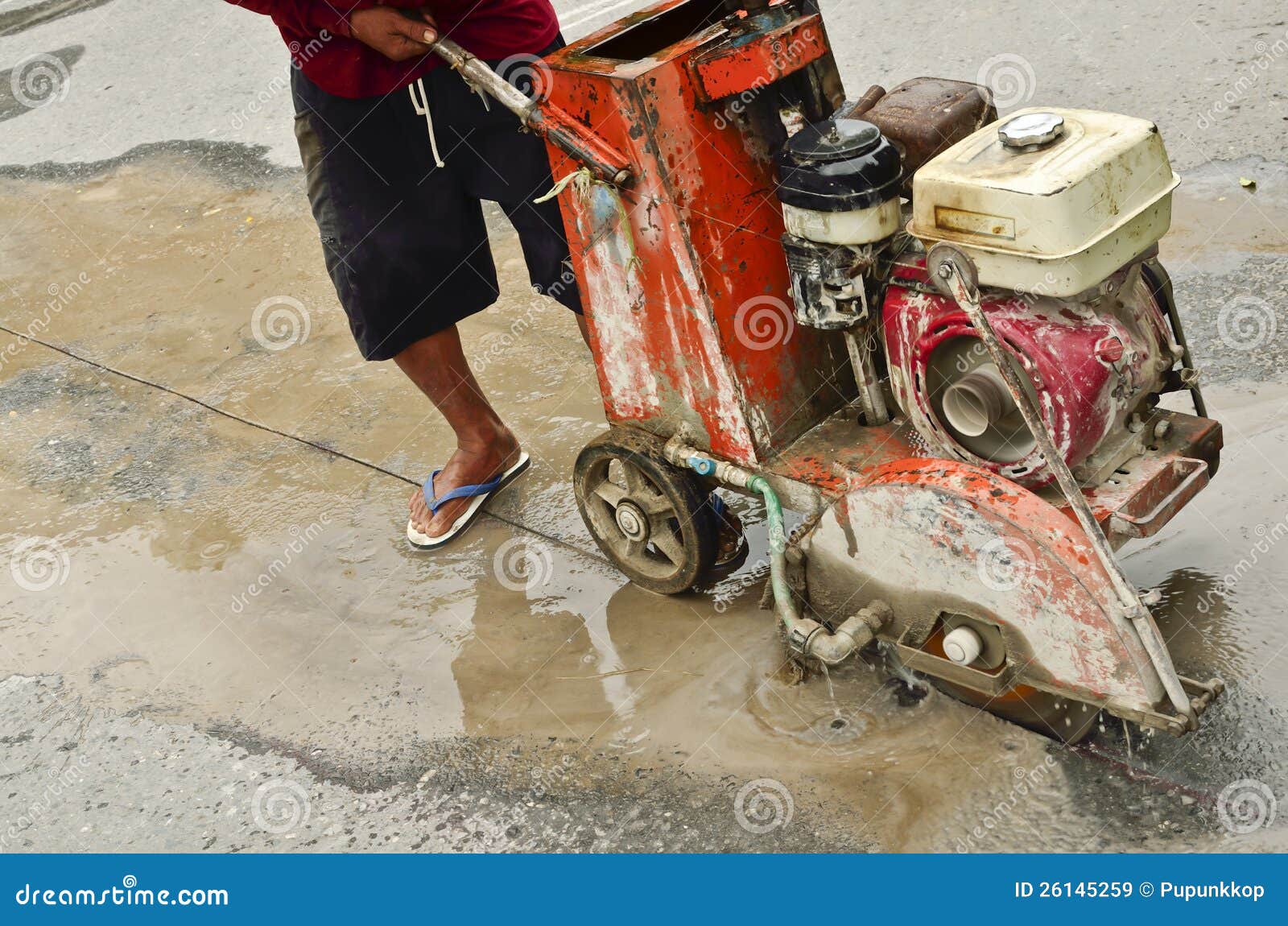 Cutting asphalt road stock image. Image of equipment 26145259