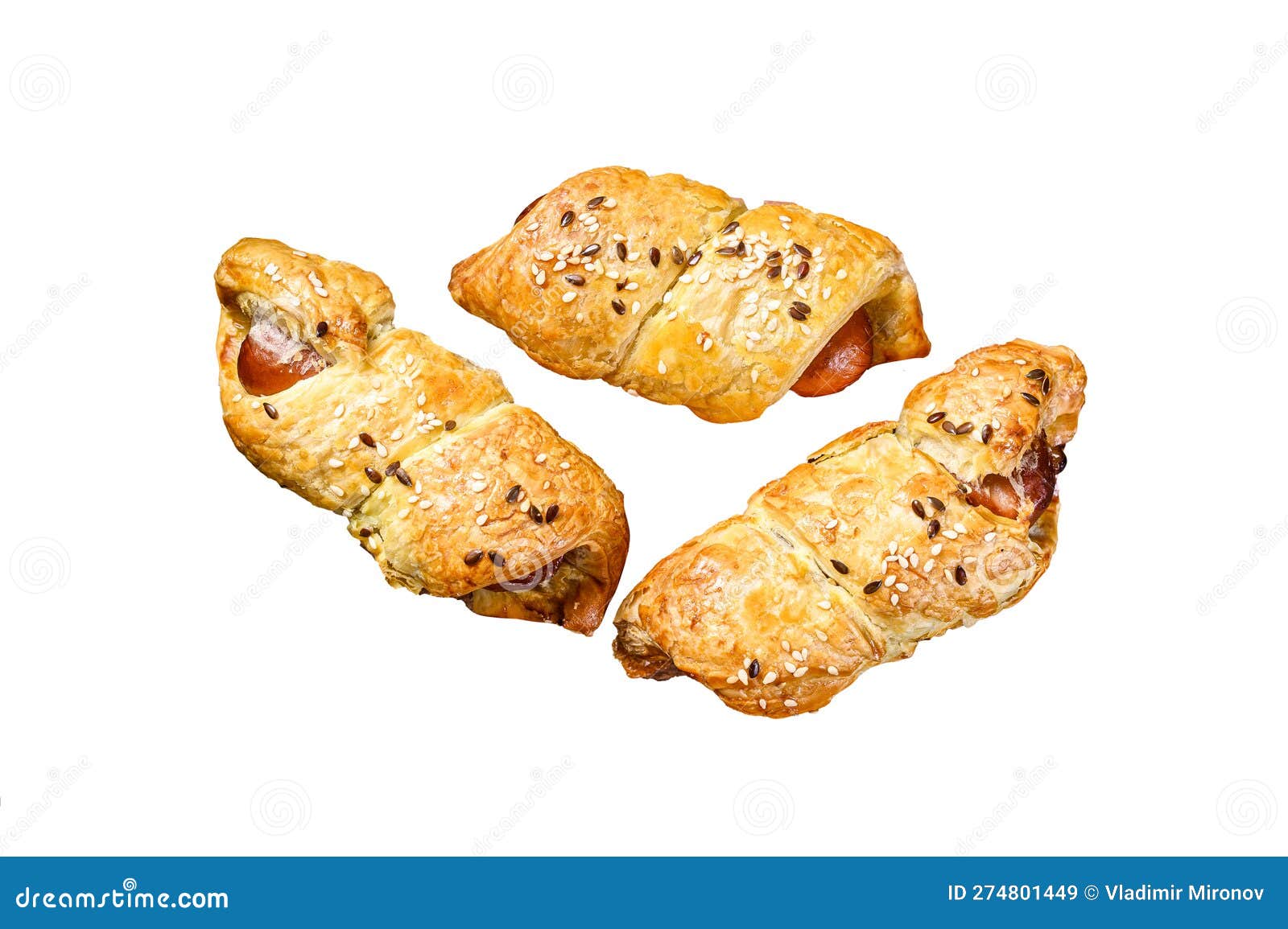 Cutting Board with Sausage Rolls in the Dough. Isolated on White