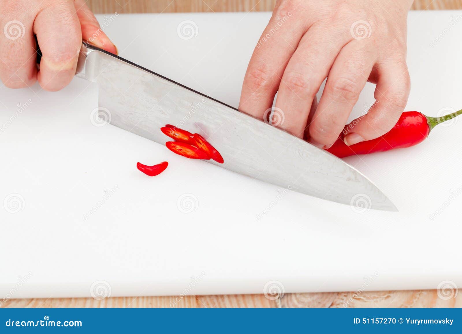 Cutting chili peppers stock photo. Image of pepper, spicy 51157270