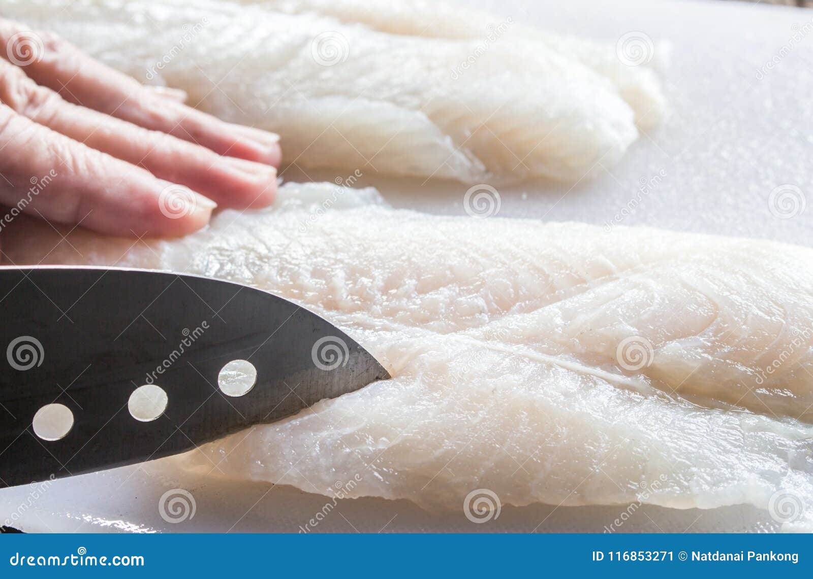 Cutting Fish on White Cutting Board Stock Image Image of cook, dish 116853271