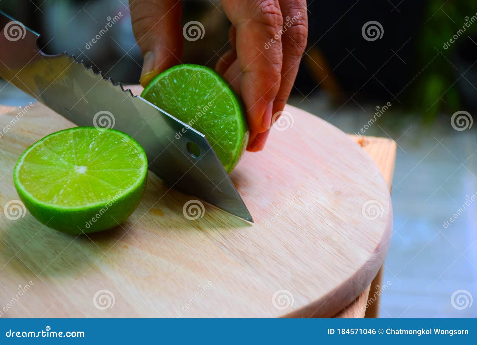 Cutting Lime on Wooden Board for Cooking Stock Photo Image of juicy