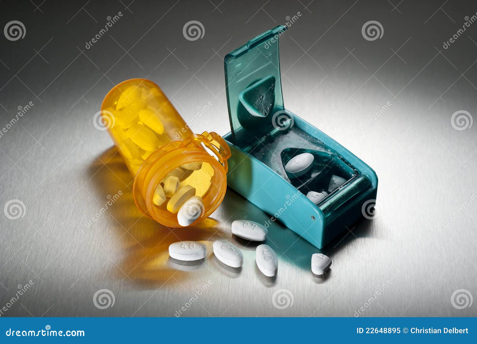 Cutting prescription pills stock image. Image of spilled 22648895