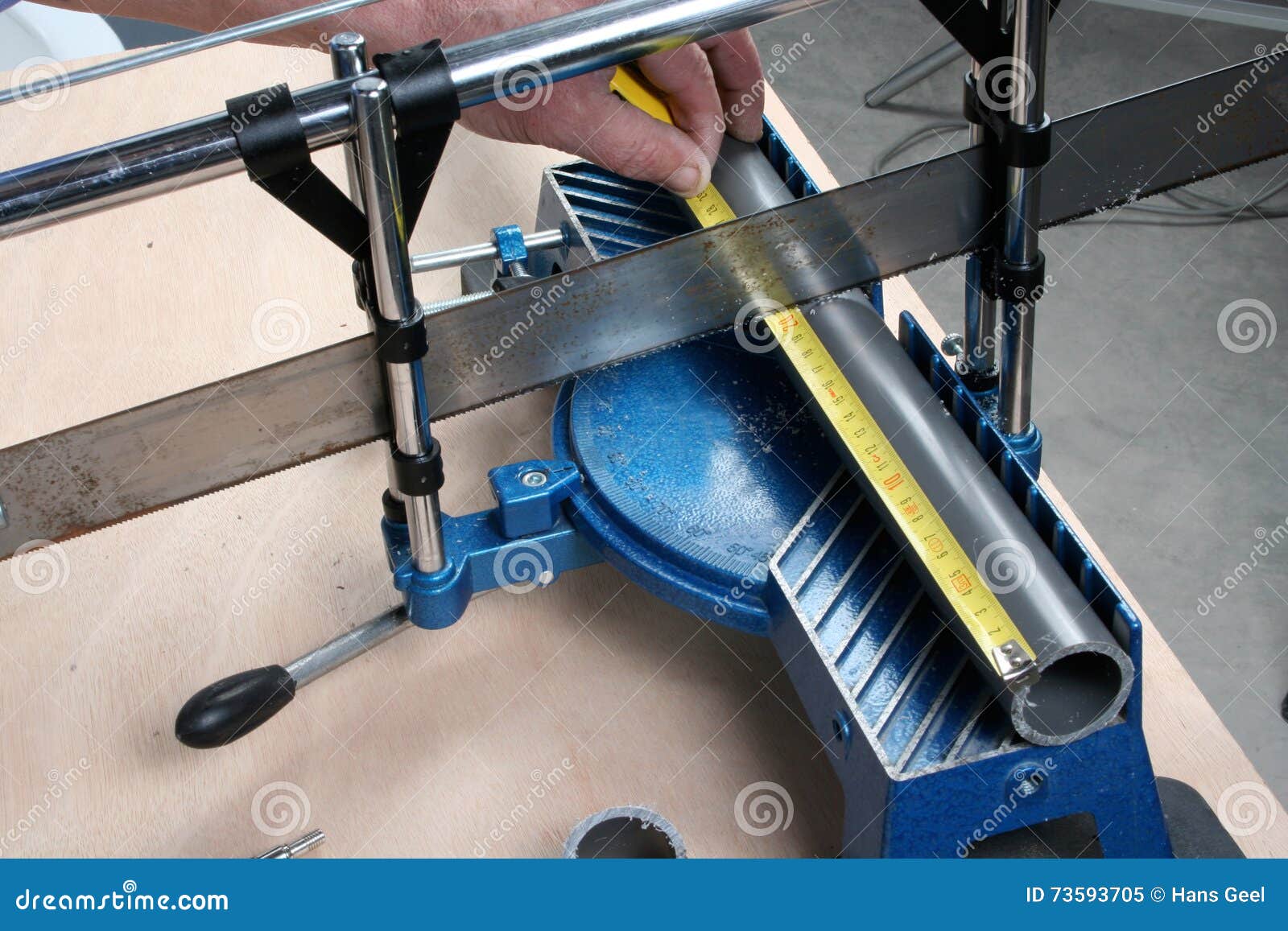 Cutting pvc pipe stock image. Image of concentration 73593705