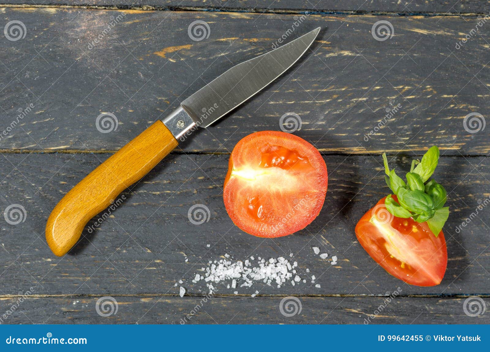 Cutting Tomatoes with a Sharp Pocket Knife. Stock Image Image of