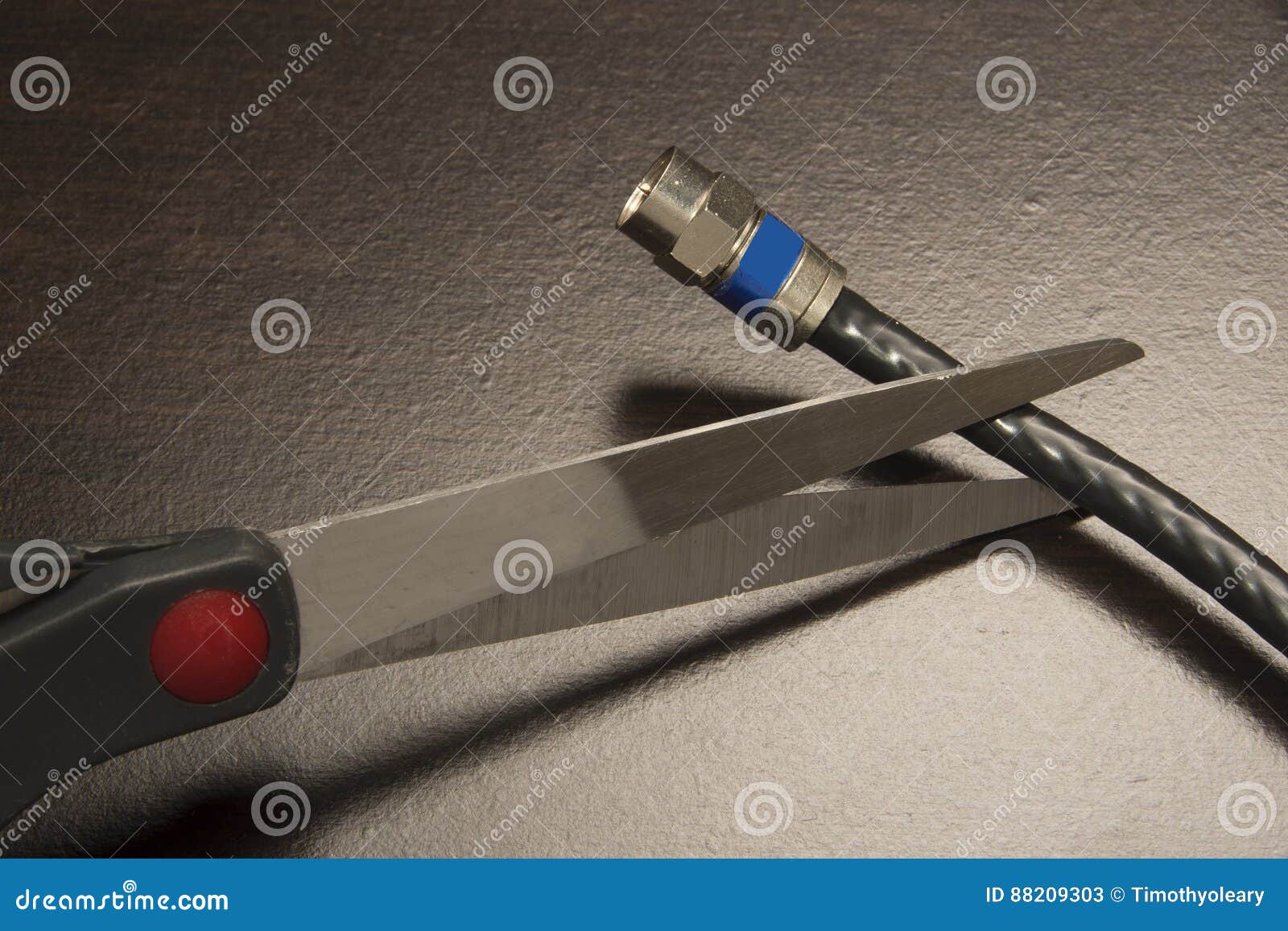 Cutting the TV Cable stock image. Image of scissors, communication