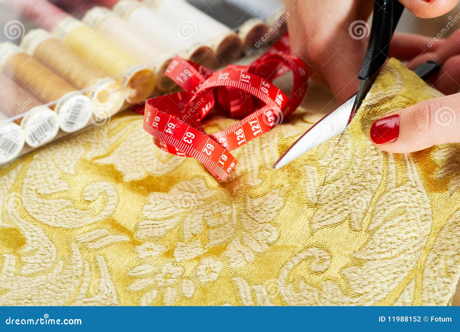 Cutting the Yellow Silk Cloth Stock Photo Image of equipment, creative 11988152