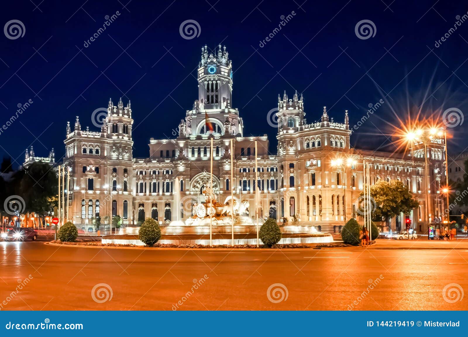 cybele palace and fountain on cibeles square at night, madrid, spain