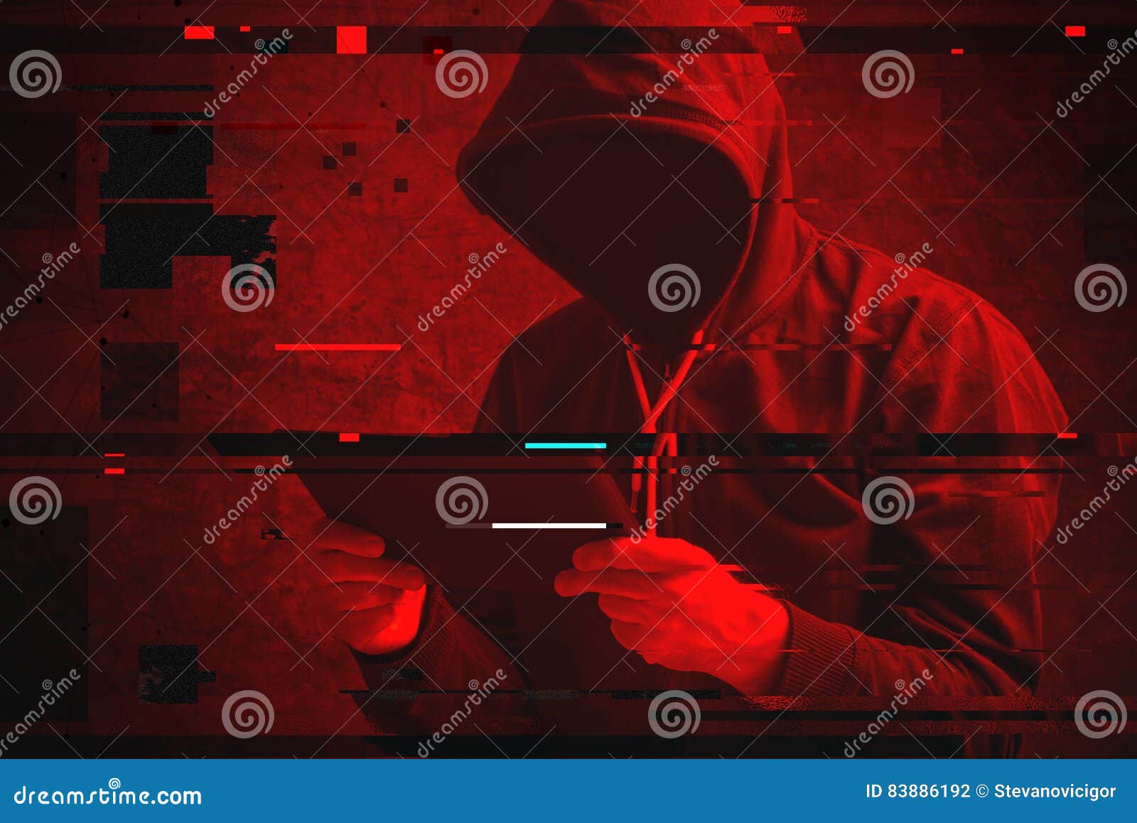 cyber attack with unrecognizable hooded hacker using tablet comp