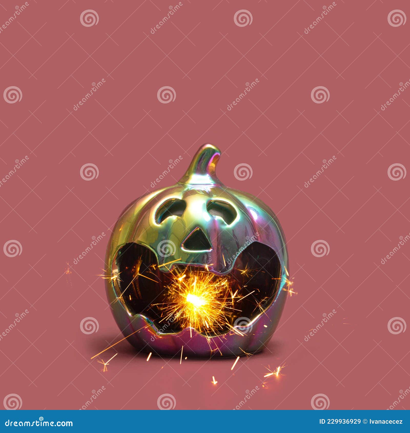 cyberpunk halloween neon looking halloween pumpkin with miracle candle magic firing out of mouth. minimal pink red background