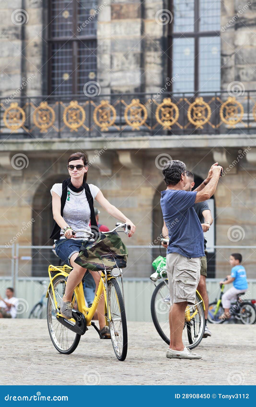 Cycling Tourist on Amsterdam Dam Square Editorial Image Image of