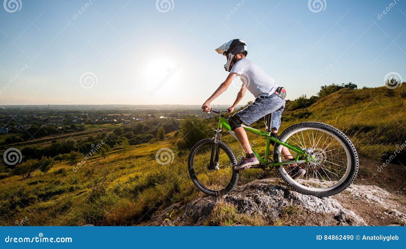 Cyclist With Mountain Bike On The Hill Under Blue Sky Stock Photo Image Of Precipice Cycle 84862490