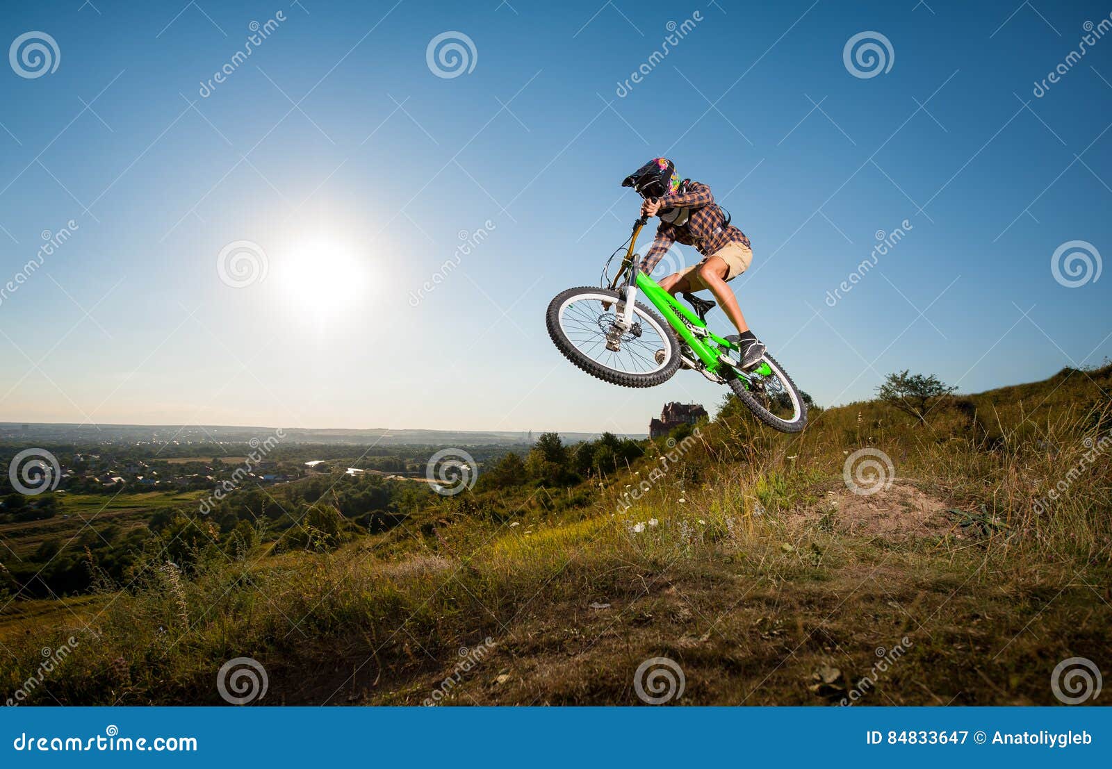 Cyclist Riding Downhill on Mountain Bike on the Hill Stock Image ...