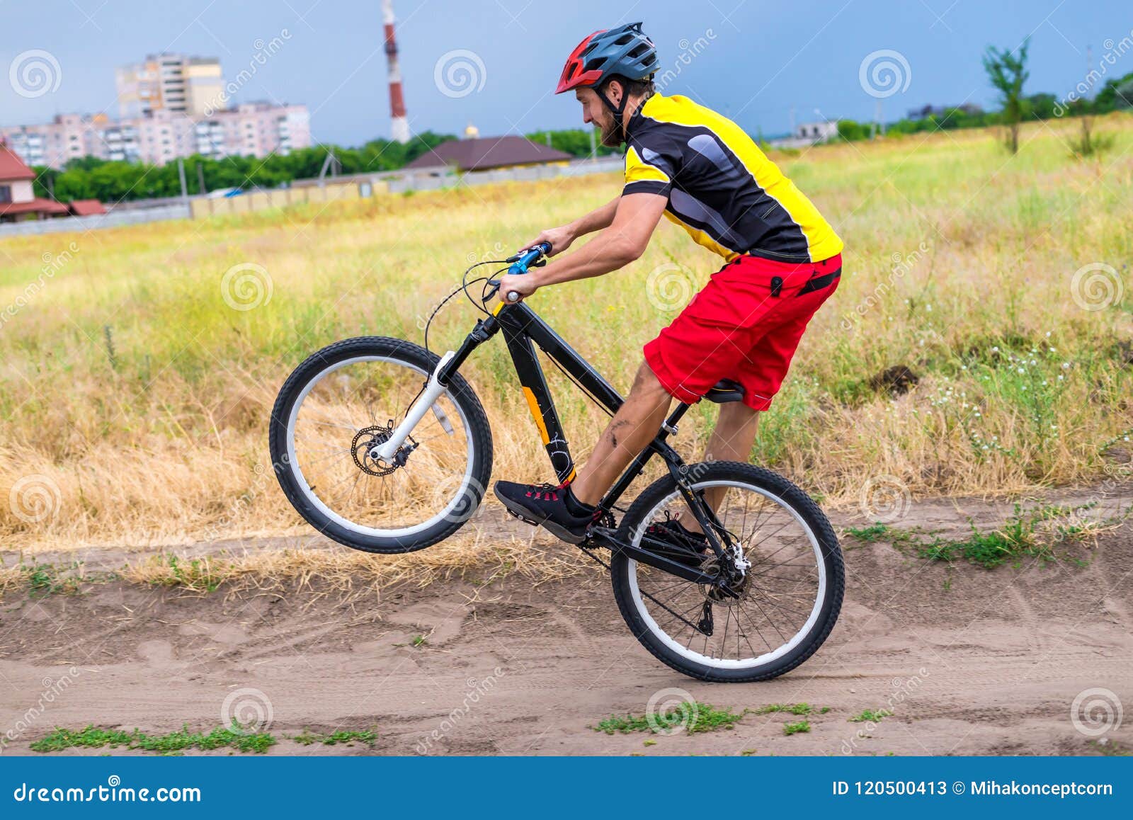 Cyclist Riding on the Rear Wheel of the Bicycle, Active Lifestyle ...