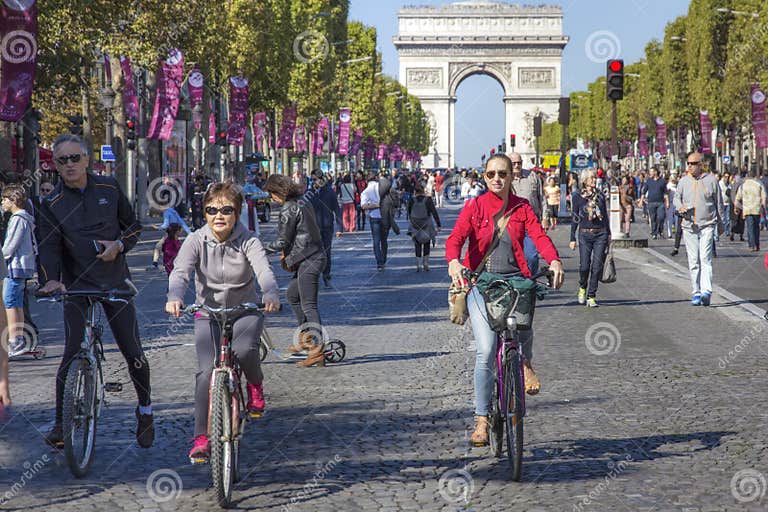 Cyclists on Champs Elysees at Paris Car Free Day Editorial Image