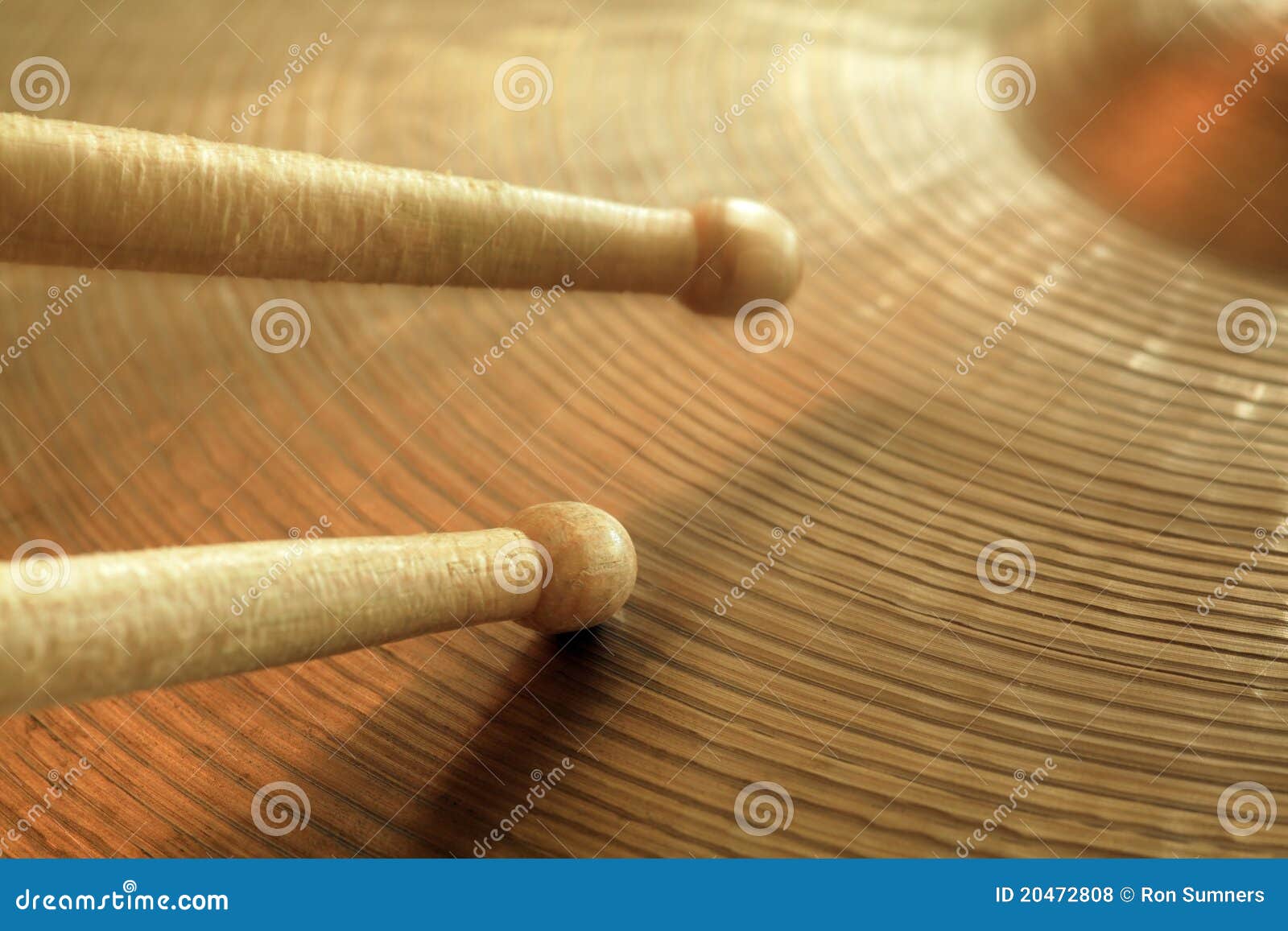 cymbal and drumsticks